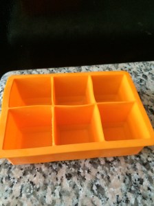 I use different sized silicone ones like this. P.S. They make perfect squares for the cutest ice cubes for cocktails after this baby food phase is over and done!